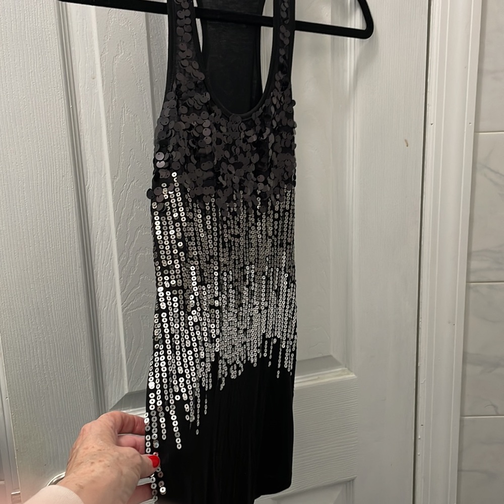 Ladies get your sexy on!!!!!     ALMOST FAMOUS racer back sequined rank